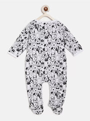 Black and white patterned baby onesie on a hanger against a white background